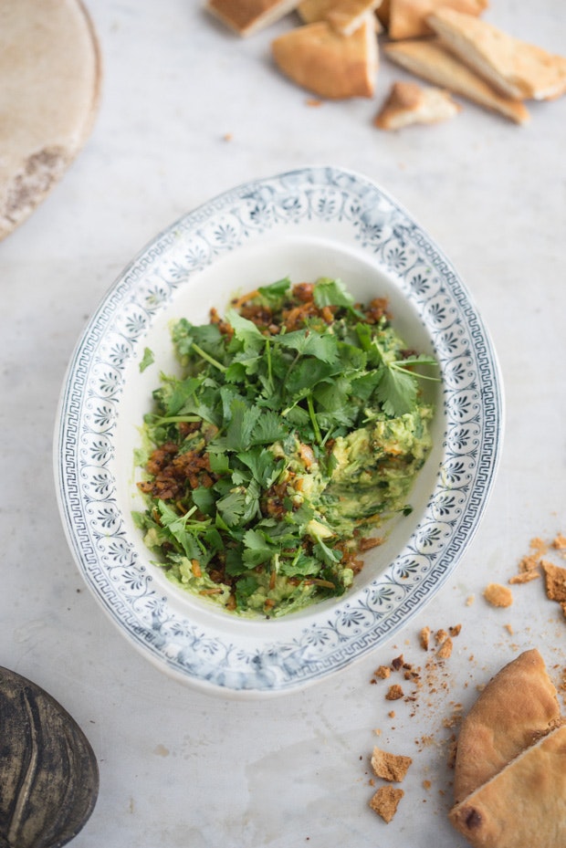 A special guacamole made with Indian spices in a decorative bowl