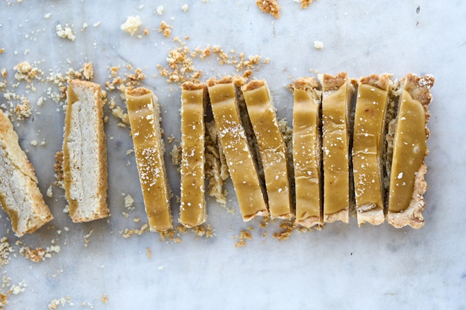 Millionaire's Shortbread in Slices on Marble Table