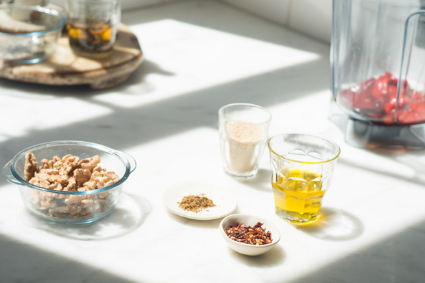 Ingredients to make Muhammara on a kitchen counter