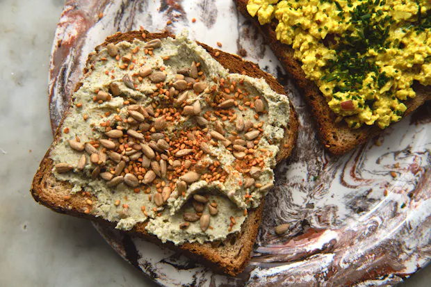 mung bean hummus on a piece of whole-grain toast