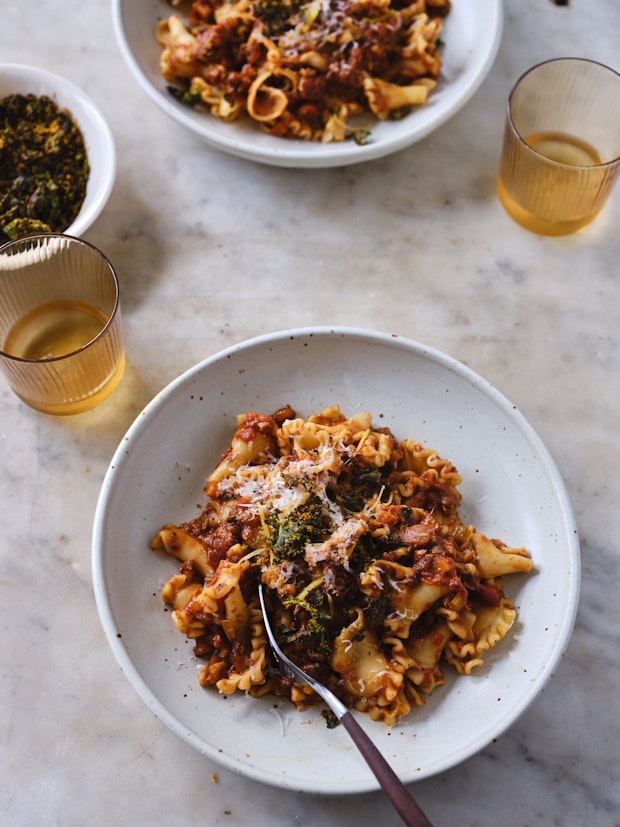Mushroom ragù served over pasta in a wide bowl