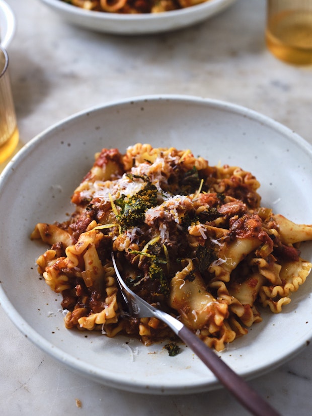 Mushroom ragù served over pasta in a wide bowl