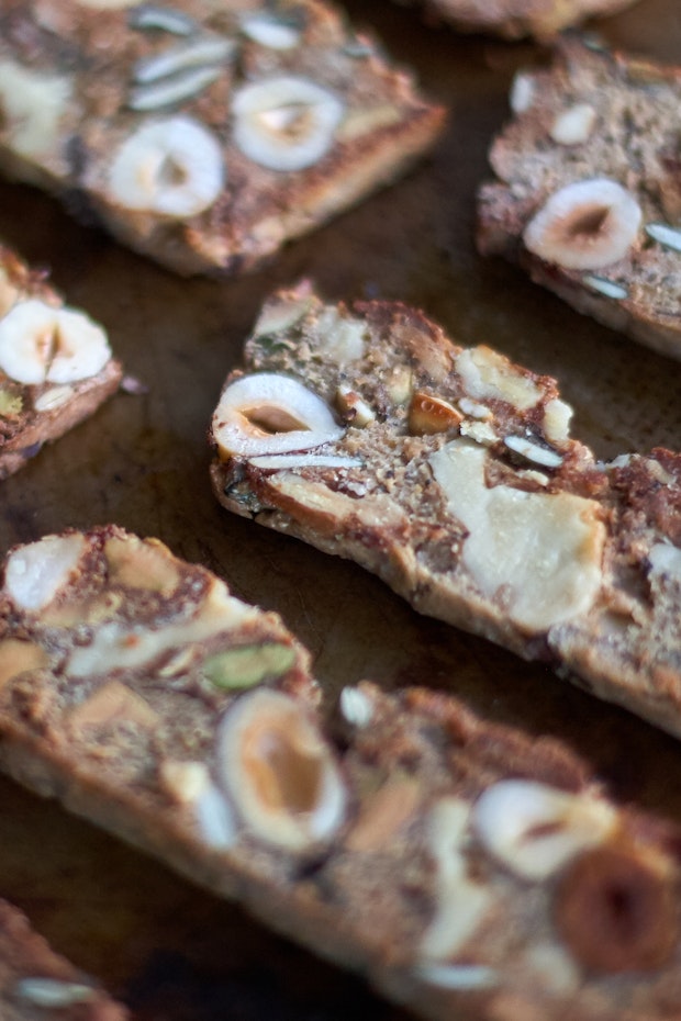 nut and seed biscotti on a baking sheet