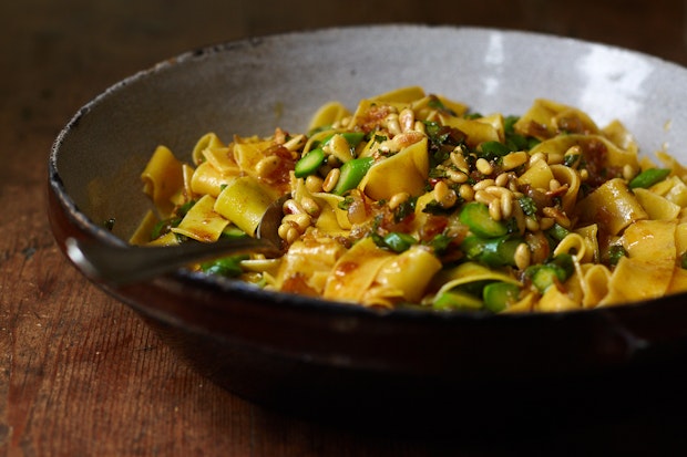 pappardelle with spiced butter in a serving bowl