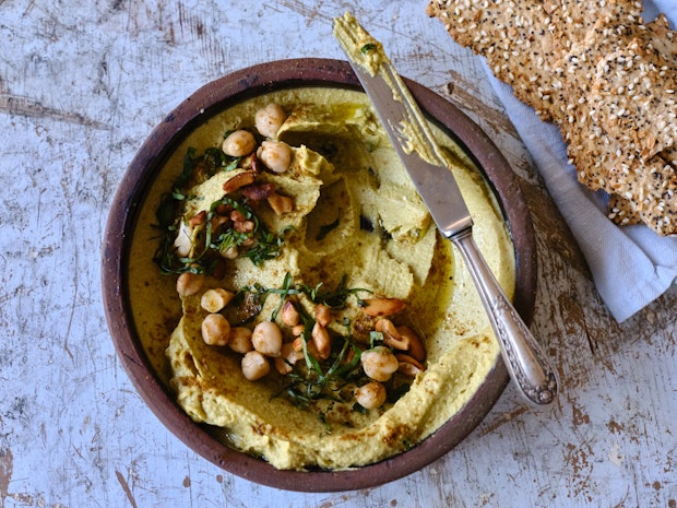 peace, love, and energy party dip in a bowl