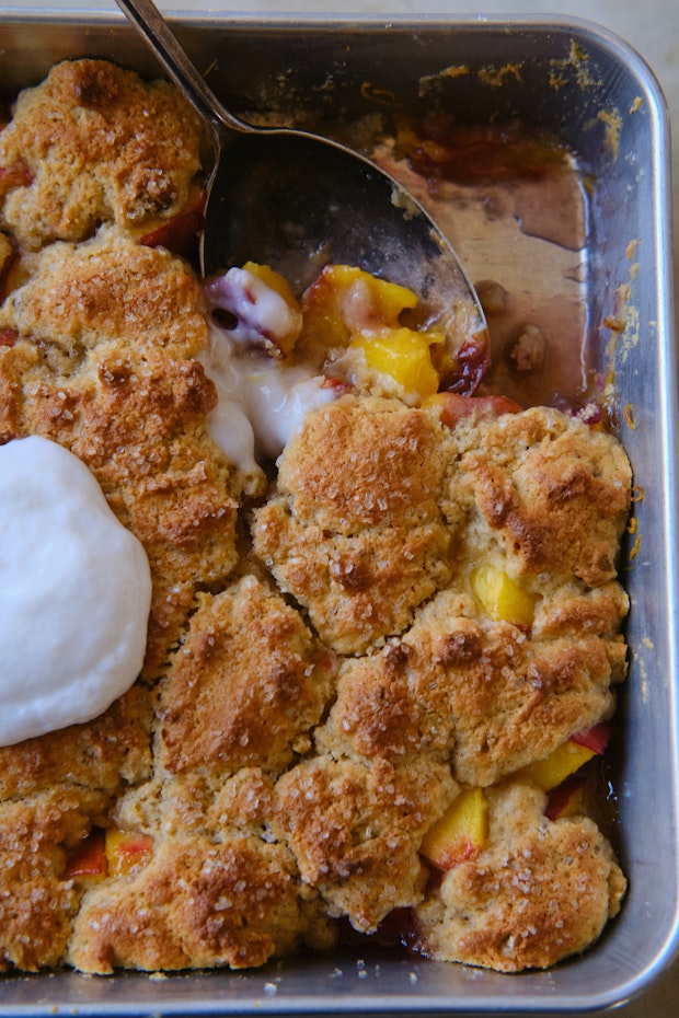 peach cobbler in a pan after baking