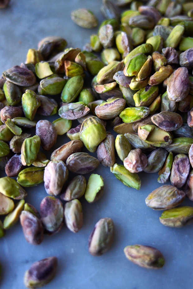 a pile of pistachio nuts