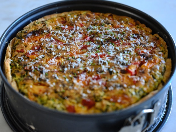 a quiche after baking in a 9-inch springform pan