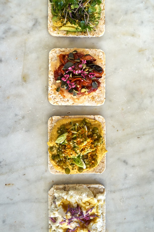 rice crackers with toppings arranged in a line