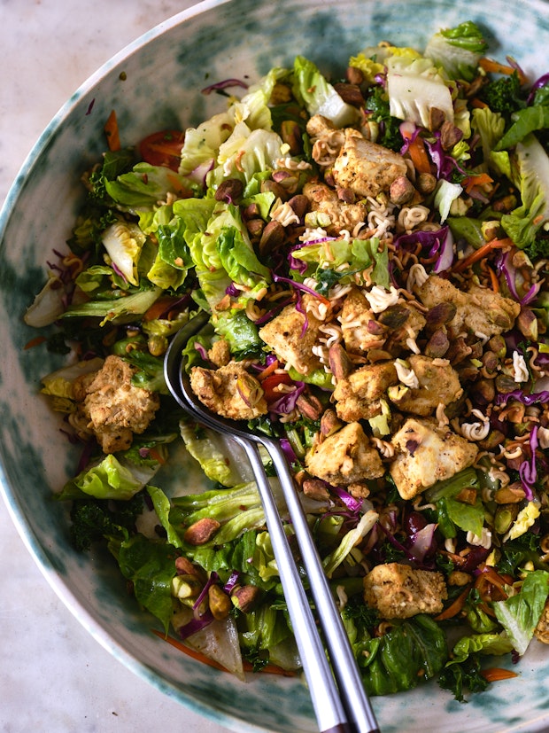 salt and pepper tofu in a large bowl with other ingredients