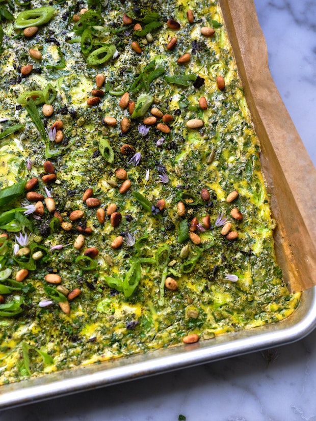 sheetpan frittata in a parchment lined baking sheet