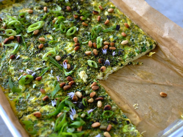 sheetpan frittata in a parchment lined baking sheet