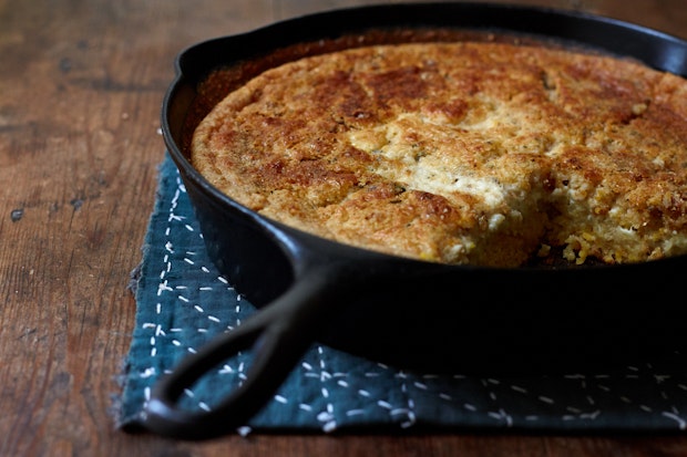 skillet cornbread with a slice removed