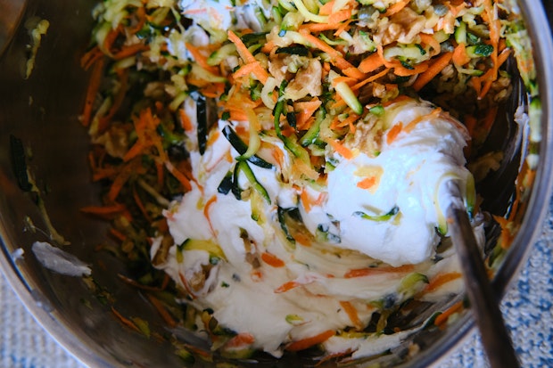 grated carrots and zucchini mixed with greek yogurt to make a toast topping