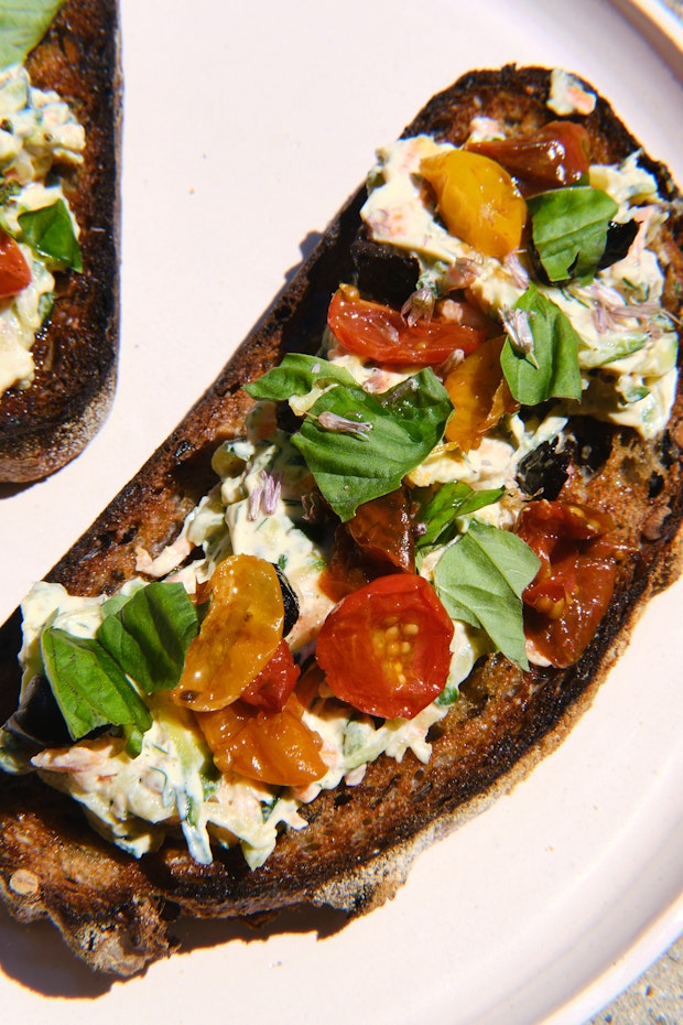 toasted sourdough topped with Greek yogurt and shredded vegetables