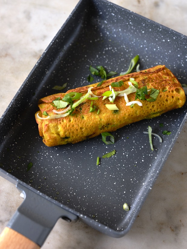 Vegan Tamagoyaki in a Bento Box on a Marble Table