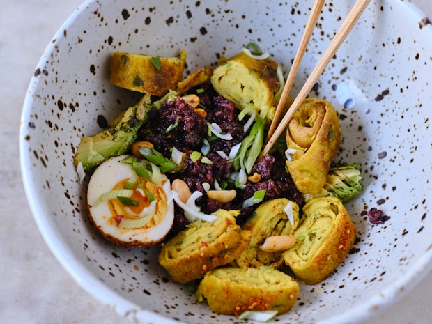 Vegan Tamagoyaki in a Bento Box on a Marble Table