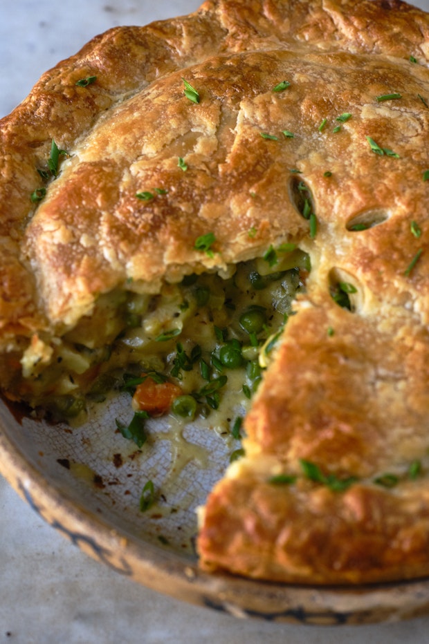 vegetable pot pie with a slice cut from it